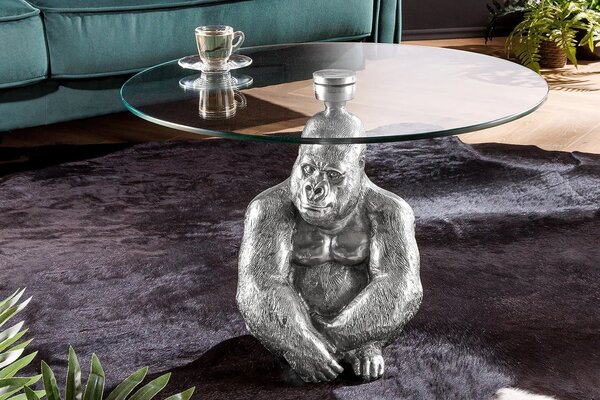 Estila Art deco okrúhly príručný stolík Tierra Glam so striebornou kovovou podstavou v podobe gorily a sklenenou doskou 60 cm