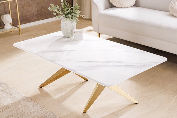 Estila Glamour mramorový obdĺžnikový konferenčný stolík Arturo s bielou doskou a dizajnovou zlatou geometrickou podstavou 130 cm