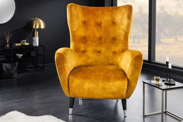Estila Art deco kreslo Bolte s horčicovým žltým zamatovým poťahom a vysokou chrbtovou opierkou s dizajnom ušiaka 106 cm