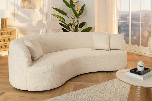 Estila Dizajnová art deco sedačka Jina v poloblúkovom tvare s béžovým poťahom z buklé látky a tromi vankúšmi 229 cm