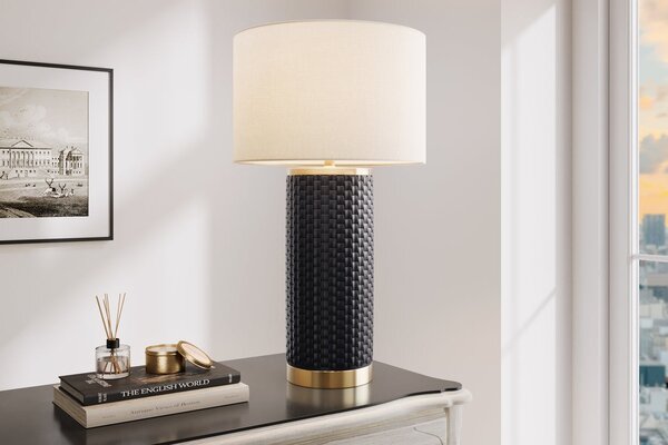 Estila Dizajnová art deco stolná lampa Draconia s čiernou reliéfnou keramickou nohou a bielym tienidlom so zlatým akcentom 70 cm