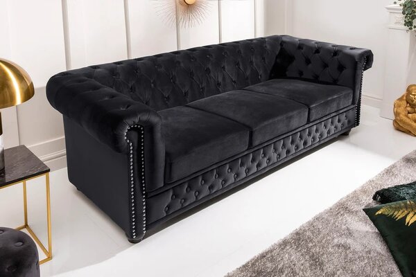 Estila Dizajnová zamatová čierna trojmiestna sedačka Maya s chesterfield prešívaním s okrúhlymi čiernymi nožičkami 205 cm