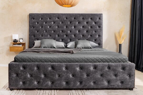 Estila Moderná čalúnená manželská posteľ Kreon s úložným priestorom a sivým zamatovým poťahom s chesterfield prešívaním 180 cm