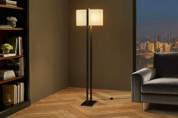 Estila Moderná stojaca lampa Ambient s oválnym béžovým textilným tienidlom a čiernou kovovou konštrukciou s podstavcom 160 cm