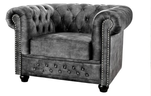 Estila Dizajnové sivé kreslo Chesterfield so zamatovým poťahom s prešívaním s okrúhlymi gombíkmi a zarolovanou opierkou 109 cm