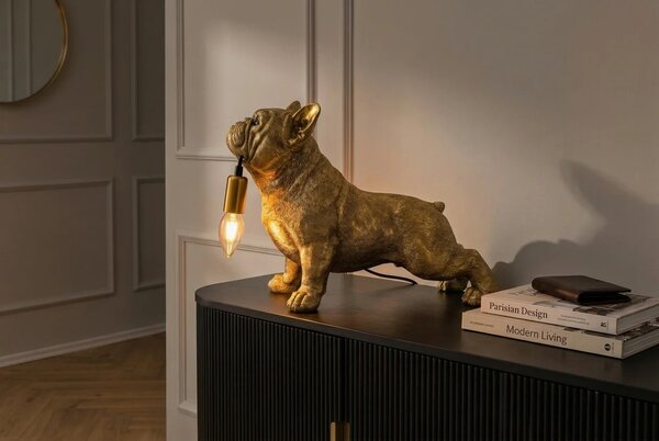 Estila Dizajnová glamour stolná lampa Tierra Glam so sochou buldoga držiaceho žiarovku v zlatej farbe 35 cm