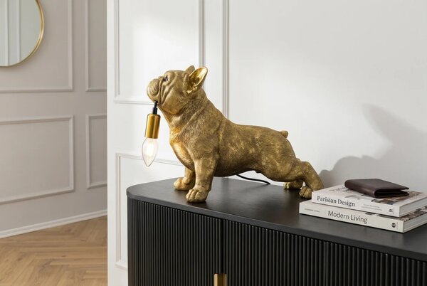 Estila Dizajnová glamour stolná lampa Tierra Glam so sochou buldoga držiaceho žiarovku v zlatej farbe 35 cm