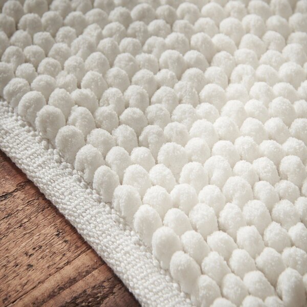 Biela kúpeľňová predložka 50x120 cm Aspen Bobble – Bianca