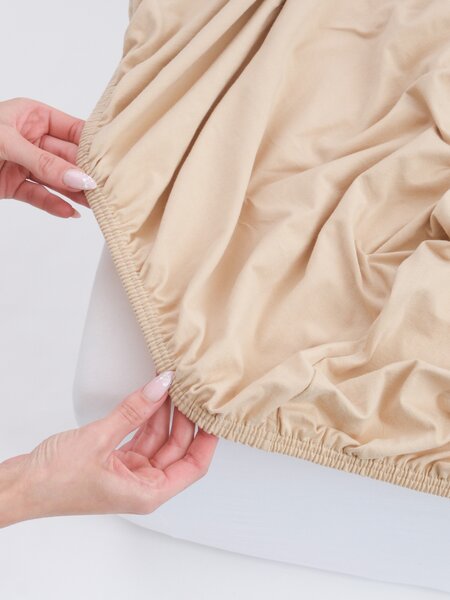 Jersey prostěradlo do postýlky s elastanem 70 × 140 cm – béžové