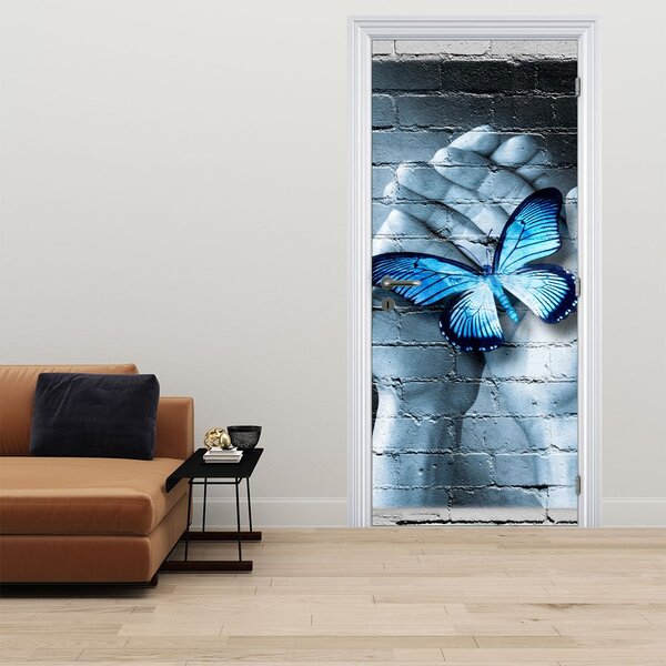 Fototapeta na dvere - Modrý motýľ na stene (95x205cm)