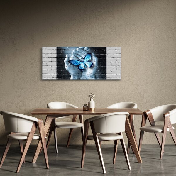 Obraz modrého motýľa na stene (120x50 cm)
