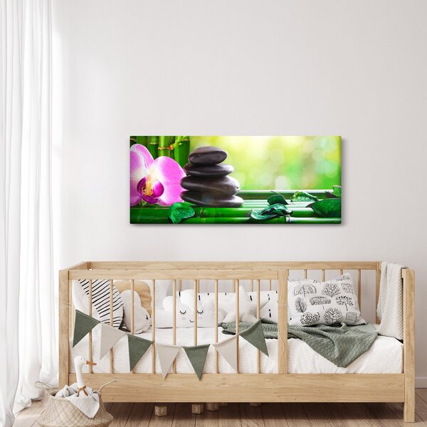 Obraz masážnych kameňov a orchidey na vode (120x50 cm)