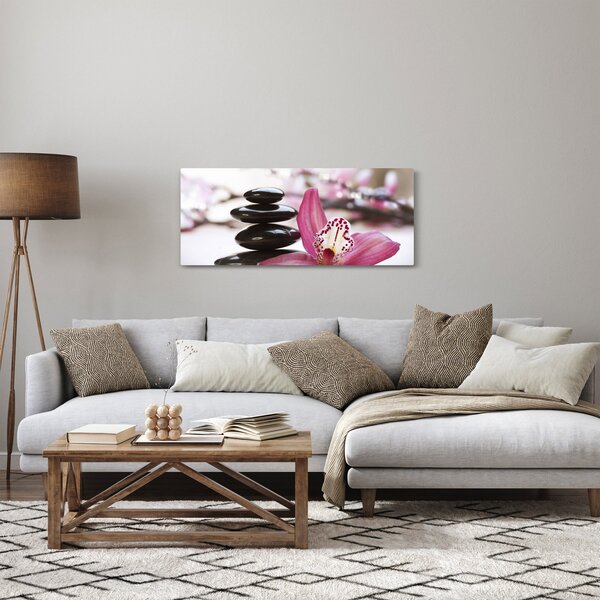 Obraz masážnych kameňov a orchidey na vode (120x50 cm)