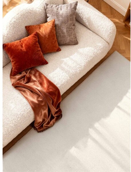 Krémový ručne tkaný vlnený koberec 160x230 cm Puristic Knots – Elle Decoration