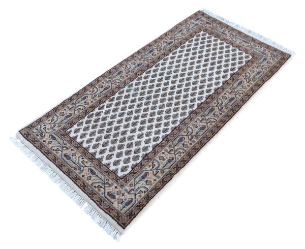 Malý vlnený koberček k posteli Laxmi Super ASS caramel 0,60 x 1,20 m
