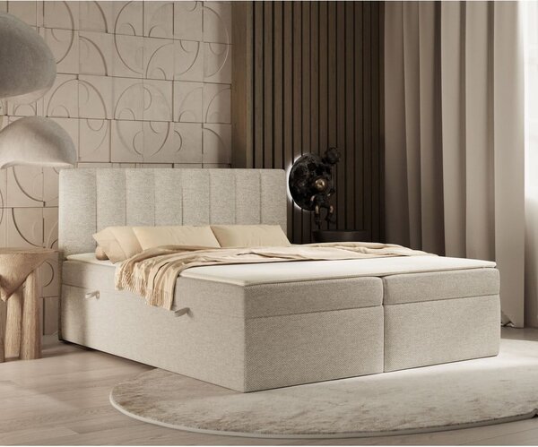 Béžová boxspring posteľ s úložným priestorom 180x200 cm Novento – Maison de Rêve