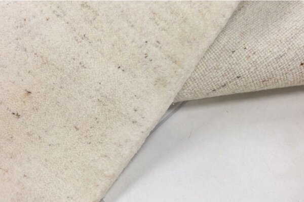 Vlnený jednofarebný ručne tkaný koberec Daleo 100 Uni Beige 0,60 x 0,95 m