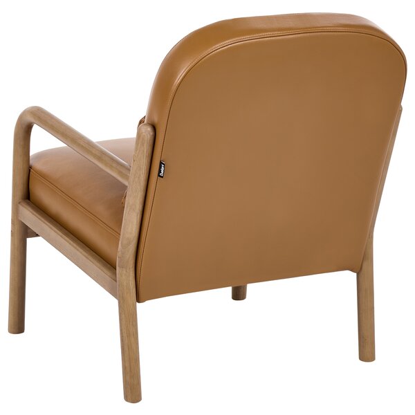 Kreslo zlatohnedé kožené čalúnenie drevený rám s vankúšom mid-century modern štýl obývacia izba