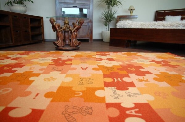 Detský metrážny koberec PUZZLE oranžový