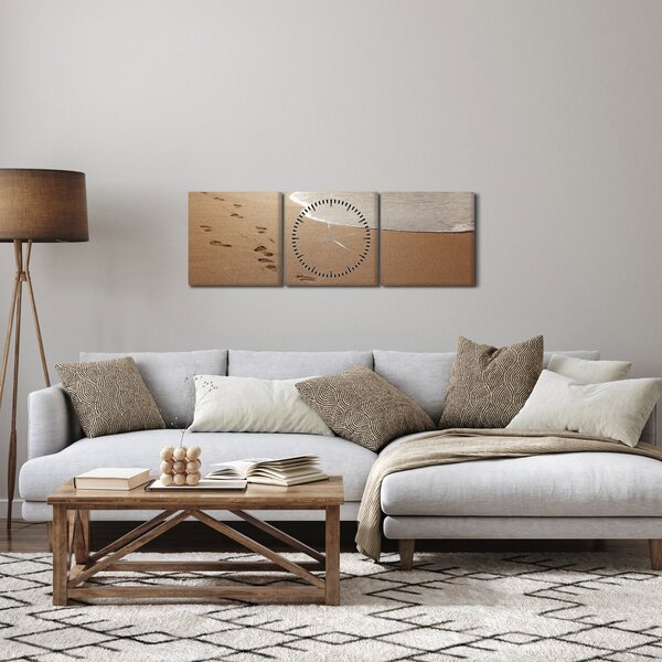 Obraz - stopy v piesku a more (s hodinami) (90x30 cm)