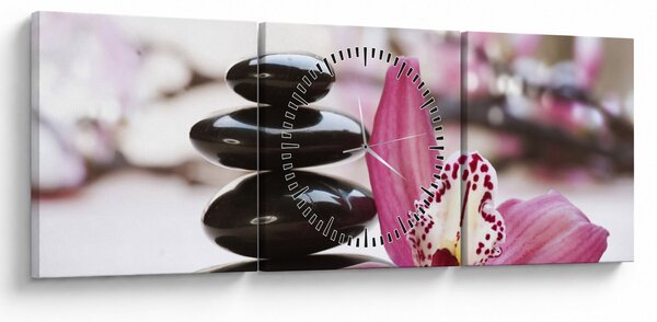 Obraz masážnych kameňov a orchidey na vode (s hodinami) (90x30 cm)
