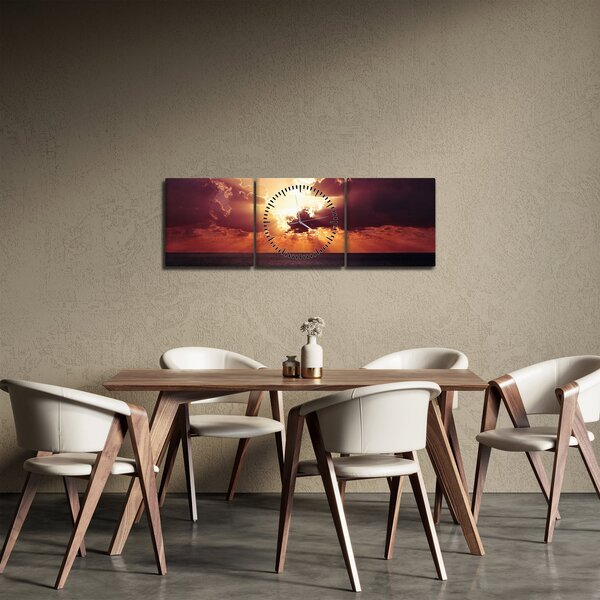 Obraz slnko za mrakmi (s hodinami) (90x30 cm)