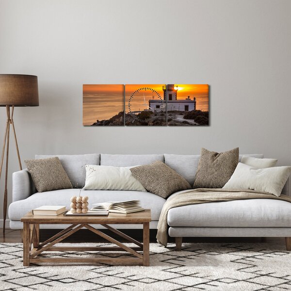 Obraz majáka pri západe slnka (s hodinami) (90x30 cm)