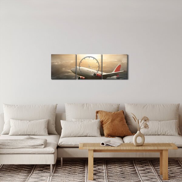 Obraz - Lietadlo v oblakoch (s hodinami) (90x30 cm)