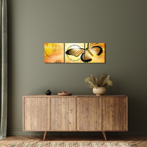 Obraz - Žltý motýľ s kvetom (s hodinami) (90x30 cm)