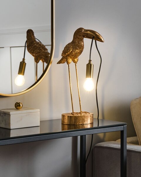 Stolná lampa zlatá polyresín zvierací motív tvar tukana moderný glamour štýl nočná lampa obývacia izba spálňa