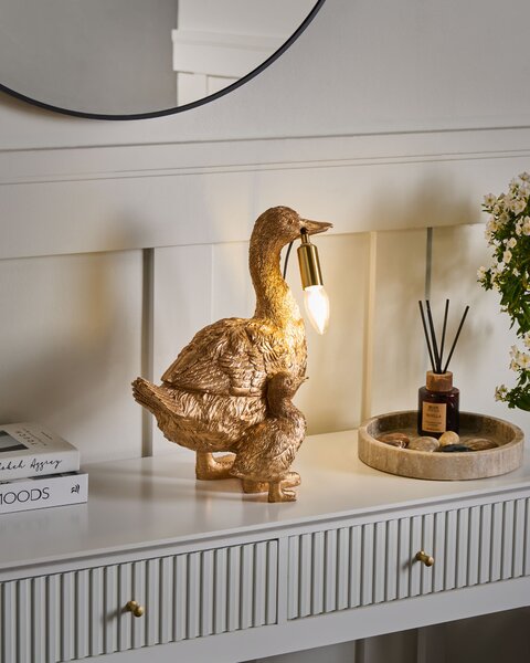 Stolná lampa zlatá polyresín zvierací motív tvar kačky moderný glamour štýl nočná lampa obývacia izba spálňa