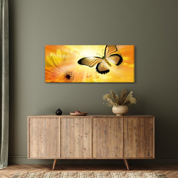 Obraz - Žltý motýľ s kvetom (120x50 cm)