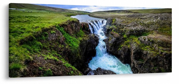 Obraz vodopádu medzi skalami (120x50 cm)