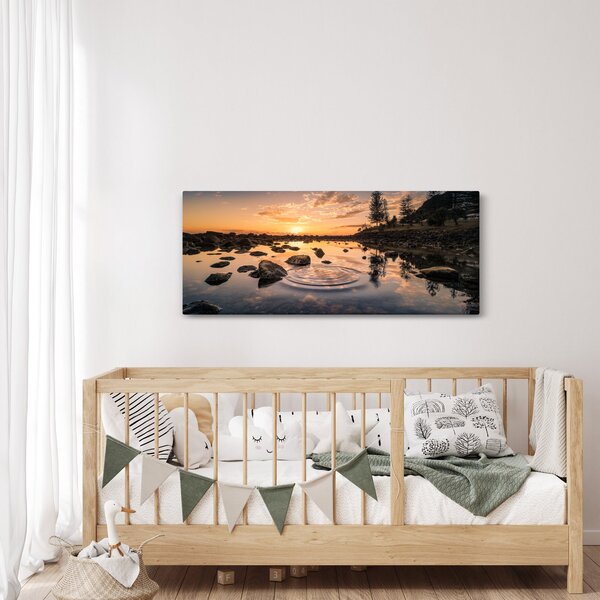 Obraz vodnej hladiny pri západe slnka (120x50 cm)