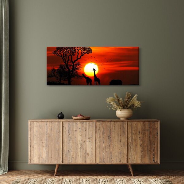 Obraz - Siluety zvierat pri západe slnka (120x50 cm)