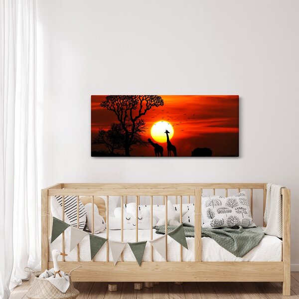 Obraz - Siluety zvierat pri západe slnka (120x50 cm)