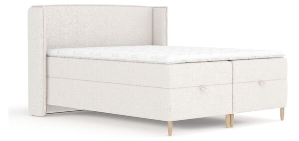 Krémová boxspring posteľ s úložným priestorom 180x200 cm Monpelli – Maison de Rêve