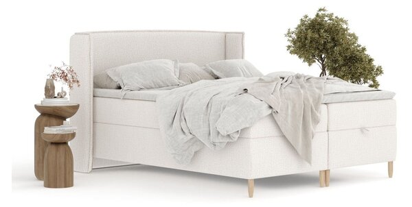 Krémová boxspring posteľ s úložným priestorom 180x200 cm Monpelli – Maison de Rêve