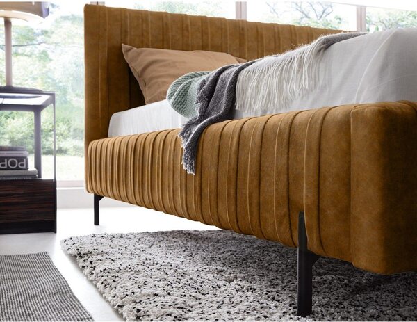 Okrovožltá čalúnená dvojlôžková posteľ s úložným priestorom s roštom 140x200 cm Plissa – ELTAP