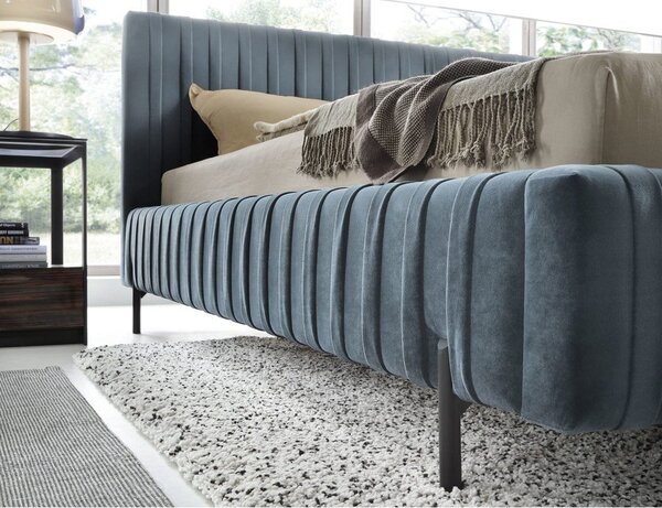 Modrá čalúnená dvojlôžková posteľ s úložným priestorom s roštom 140x200 cm Plissa – ELTAP
