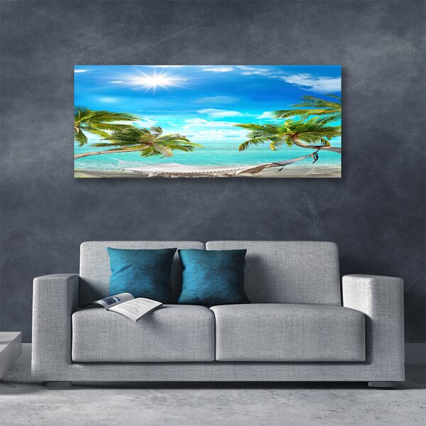 Obraz Canvas Tropické palmy hamaka pláž 125x50 cm