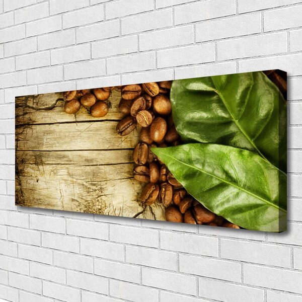 Obraz na plátne Zrnká káva listy kuchyňa 125x50 cm
