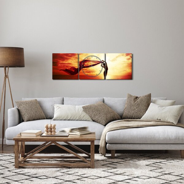 Obraz - Silueta ženy v západu slnka (s hodinami) (90x30 cm)