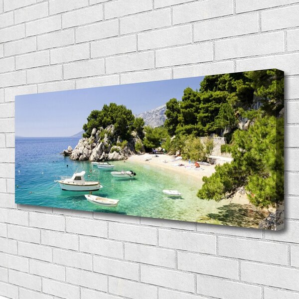 Obraz Canvas More pláž skaly lode 125x50 cm