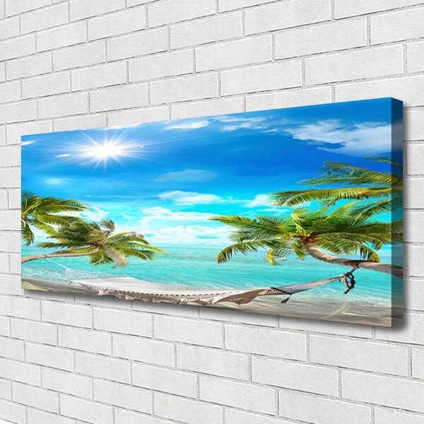 Obraz Canvas Tropické palmy hamaka pláž 125x50 cm