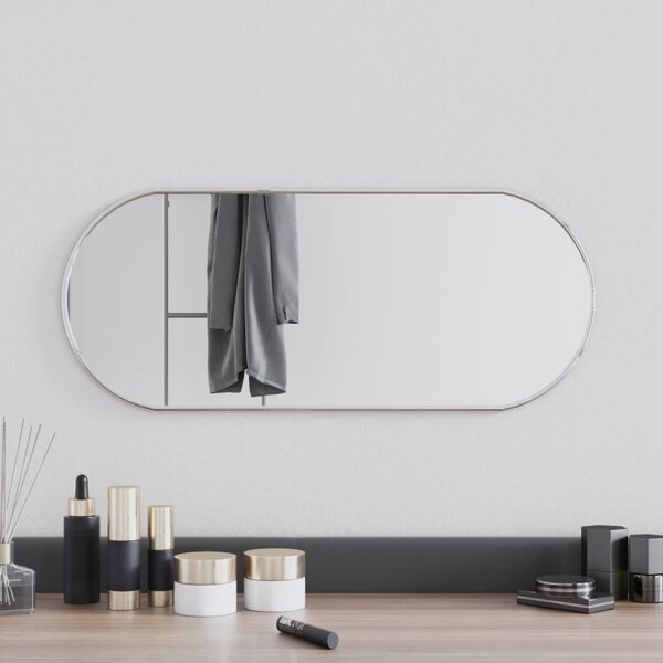 Nástenné zrkadlo strieborné 60x25 cm oválne