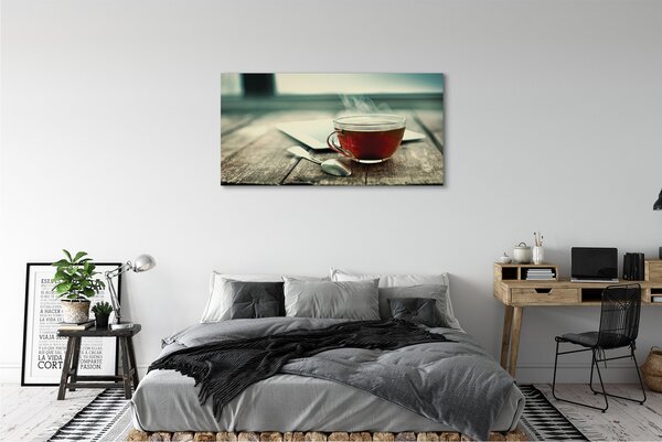 Obraz canvas Ohrievať lyžičku čaju 125x50 cm