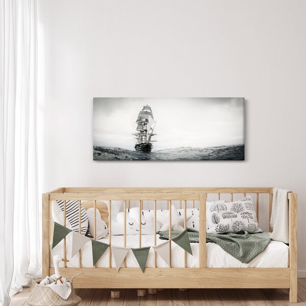 Obraz - Loď plávajúca po oceáne (120x50 cm)