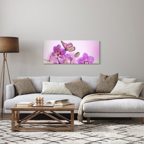 Obraz - Motýľ na kvetoch orchidey, lila (120x50 cm)