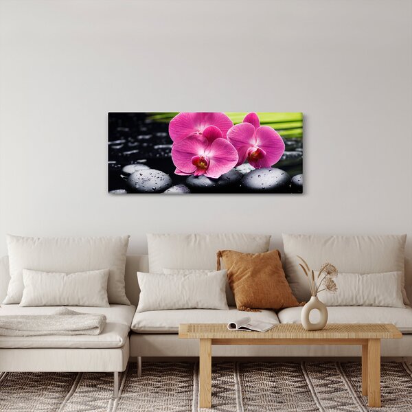 Obraz - Ružové orchidey s palmovým listom (120x50 cm)